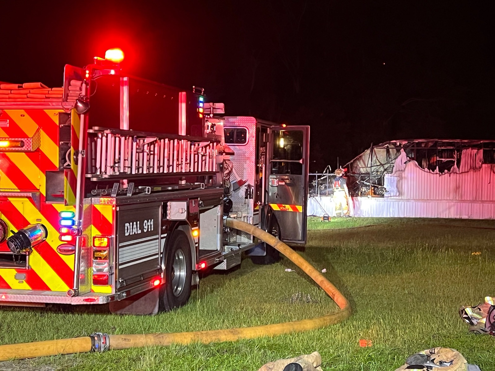 Engine 231 working a structure fire at night